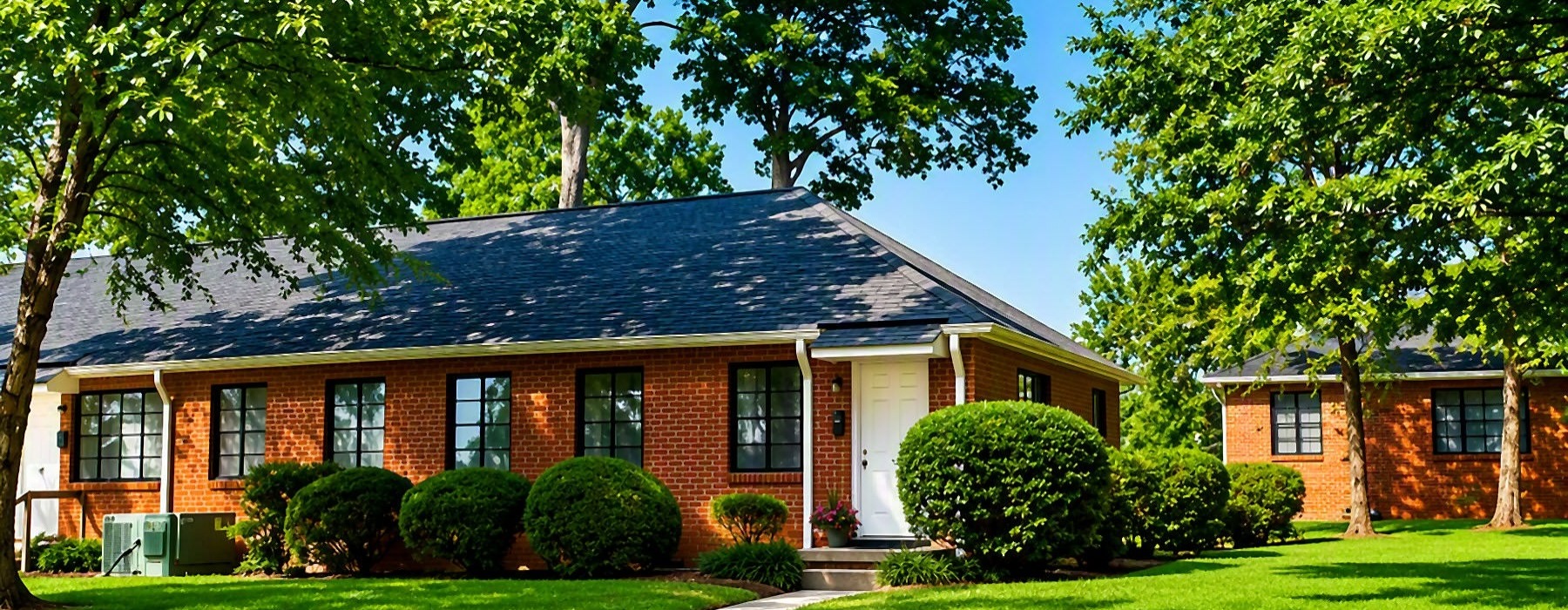 a brick house with a driveway